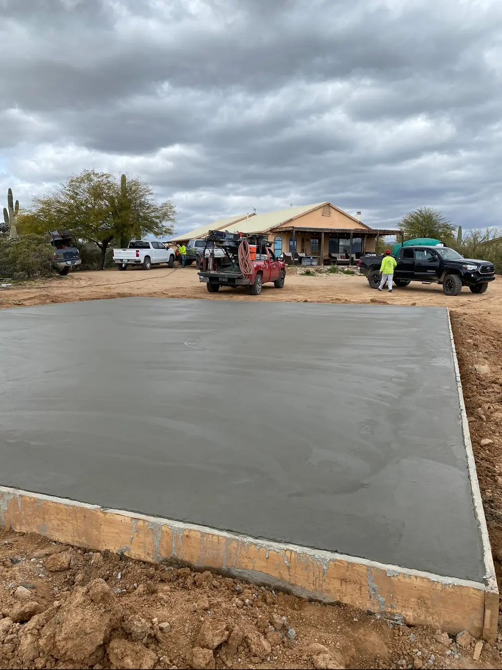 Fresh concrete slab poured at a desert home site in Phoenix AZ