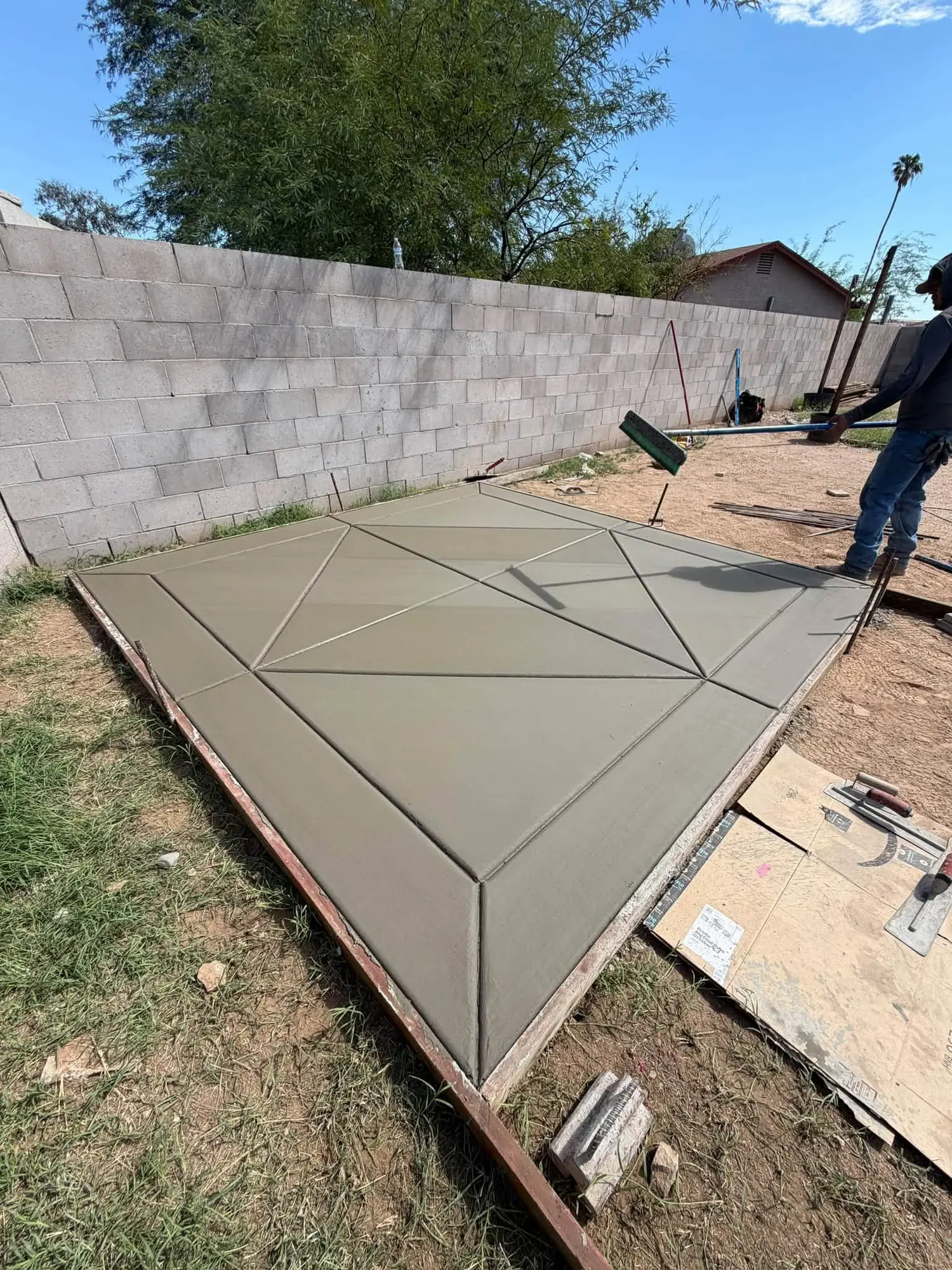 Stamped decorative concrete patio poured in Phoenix AZ backyard